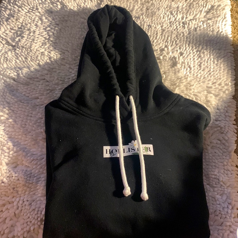 Hollister Size M black hoodie with white logos. Has gotten to small to wear